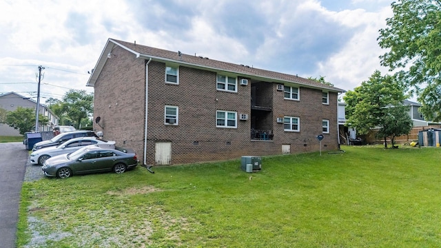 65 Woodlee Rd, Staunton, VA 24401 - rear view of property featuring a yard and brick siding