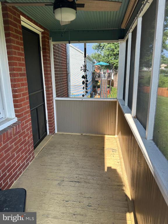 2 Terrace Ln, Luray, VA 22835 - unfurnished sunroom with ceiling fan