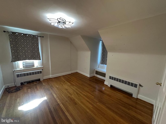 2 Terrace Ln, Luray, VA 22835 - bonus room featuring radiator heating unit, wood finished floors, cooling unit, and lofted ceiling
