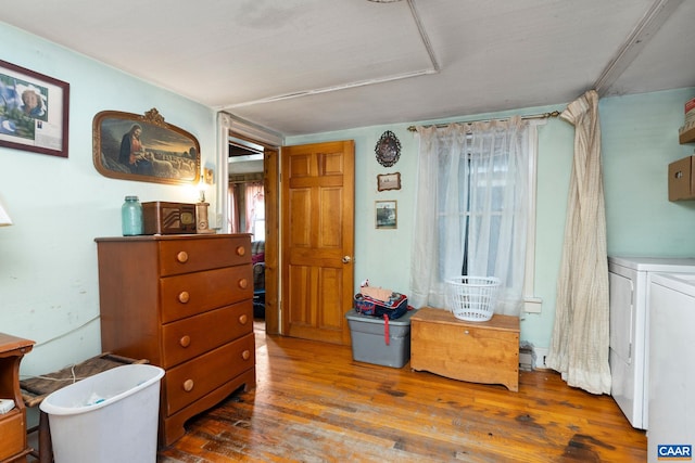 613 6th St, Shenandoah, VA 22849 - bedroom with washing machine and clothes dryer and hardwood / wood-style floors