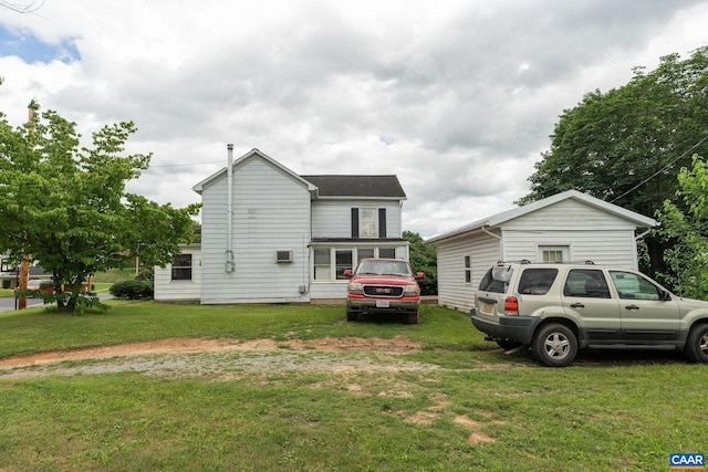 613 6th St, Shenandoah, VA 22849 - view of property exterior featuring a lawn, an AC wall unit, and roof with shingles