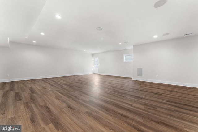  - empty room featuring dark wood finished floors and recessed lighting