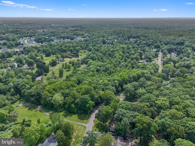  - drone / aerial view of a heavily wooded area