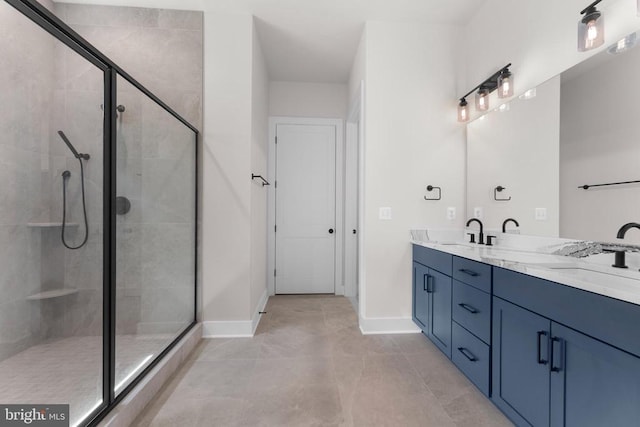  - full bath featuring a shower stall and double vanity