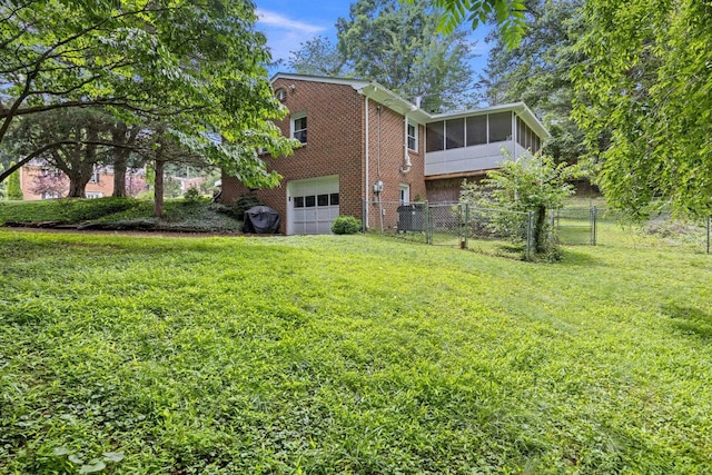 1233 Pinehurst Rd, Staunton, VA 24401 - back of house with a sunroom, brick siding, and an attached garage