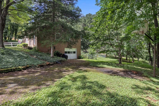 1233 Pinehurst Rd, Staunton, VA 24401 - view of yard featuring dirt driveway and an attached garage