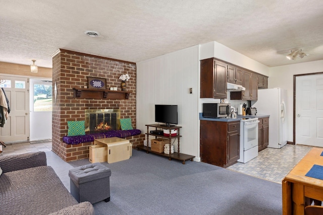 1233 Pinehurst Rd, Staunton, VA 24401 - living room featuring a textured ceiling, a brick fireplace, and light colored carpet