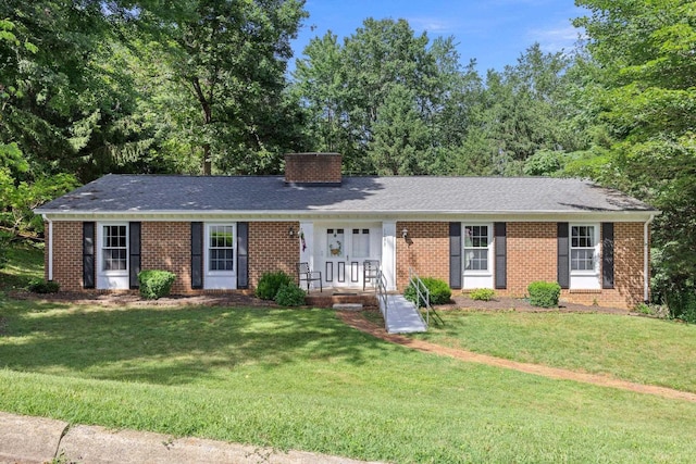 1233 Pinehurst Rd, Staunton, VA 24401 - ranch-style house with a front lawn, brick siding, and a chimney