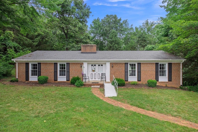 1233 Pinehurst Rd, Staunton, VA 24401 - single story home featuring brick siding, a front lawn, and a chimney