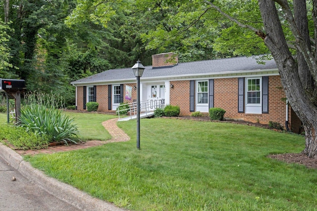 1233 Pinehurst Rd, Staunton, VA 24401 - single story home with brick siding, a chimney, and a front yard