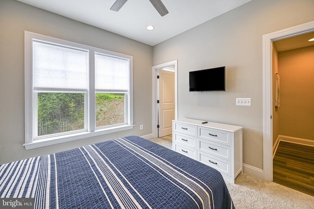 bedroom with baseboards, light colored carpet, ceiling fan, and recessed lighting