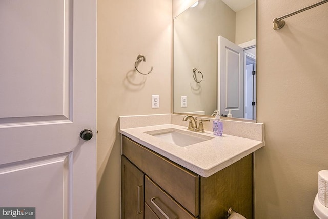 half bathroom with vanity