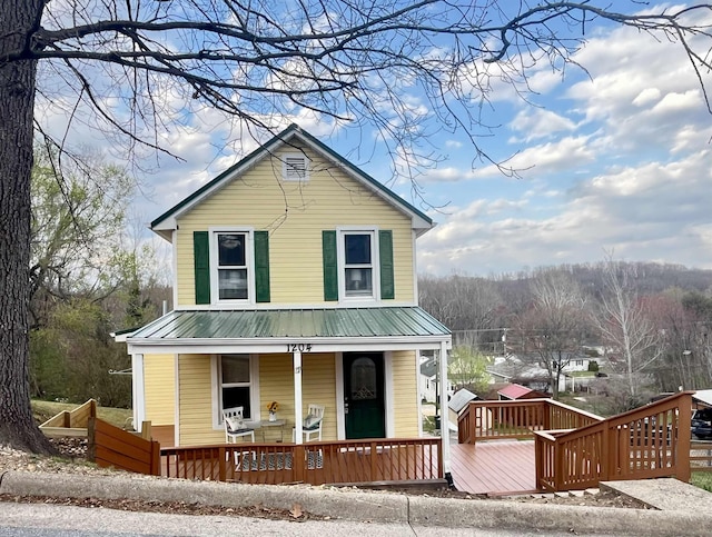 1204 3rd St, Waynesboro, VA 22980 - view of front of house with metal roof and a porch