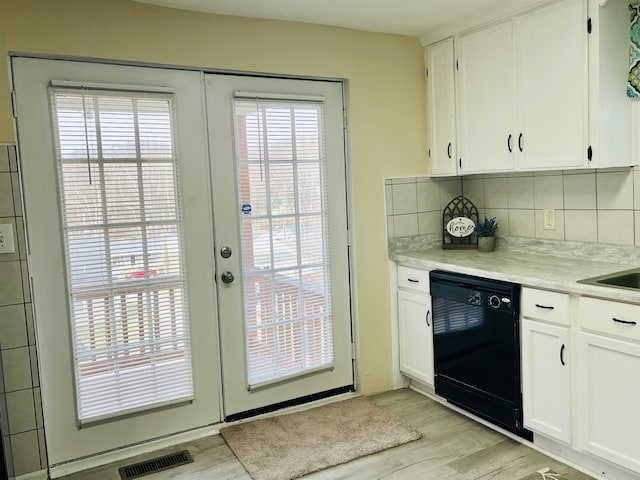 1204 3rd St, Waynesboro, VA 22980 - entryway featuring light wood-style floors, visible vents, and french doors