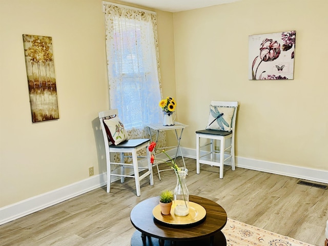 1204 3rd St, Waynesboro, VA 22980 - sitting room featuring baseboards, visible vents, and wood finished floors
