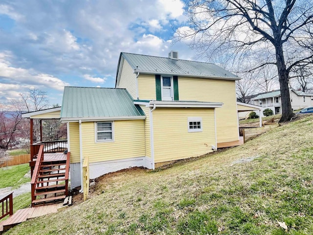 1204 3rd St, Waynesboro, VA 22980 - rear view of property featuring metal roof and a yard