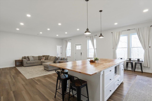 115 Mountain Top Ln, New Market, VA 22844 - kitchen with butcher block countertops, dark wood-style flooring, recessed lighting, and white cabinets