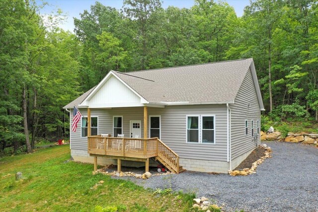115 Mountain Top Ln, New Market, VA 22844 - view of front of home featuring roof with shingles, a wooden deck, and a view of trees