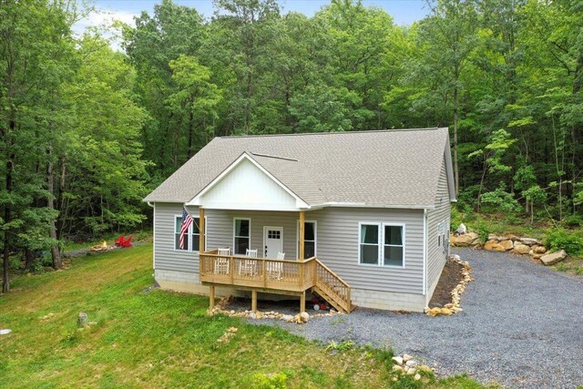 115 Mountain Top Ln, New Market, VA 22844 - view of front of property with a shingled roof, a front yard, and a wooded view
