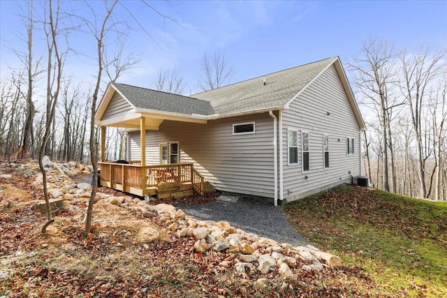 115 Mountain Top Ln, New Market, VA 22844 - view of property exterior featuring a shingled roof, central AC unit, and a deck
