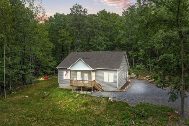 115 Mountain Top Ln, New Market, VA 22844 - view of front of home featuring roof with shingles, a forest view, and a front yard