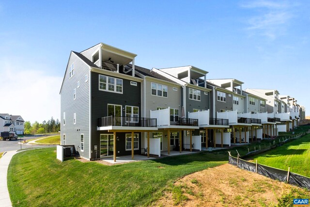 1234 Laconia Ln, Charlottesville, VA 22911 - rear view of property featuring a residential view, a ceiling fan, a balcony, a yard, and a patio area