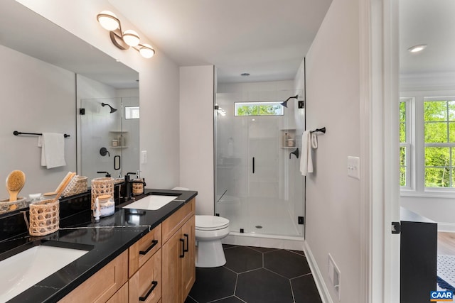 1234 Laconia Ln, Charlottesville, VA 22911 - full bathroom featuring a sink, toilet, tile patterned floors, a stall shower, and double vanity
