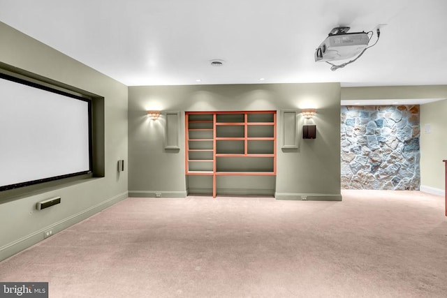 - carpeted cinema with baseboards
