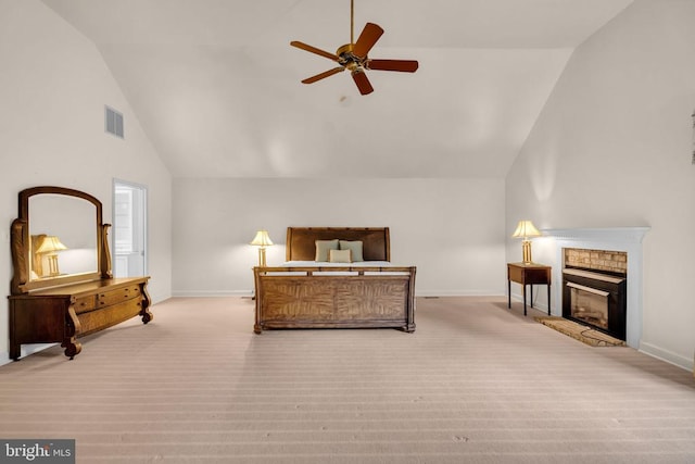  - carpeted bedroom with vaulted ceiling and a fireplace