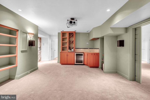  - indoor wet bar featuring beverage cooler, light carpet, and recessed lighting