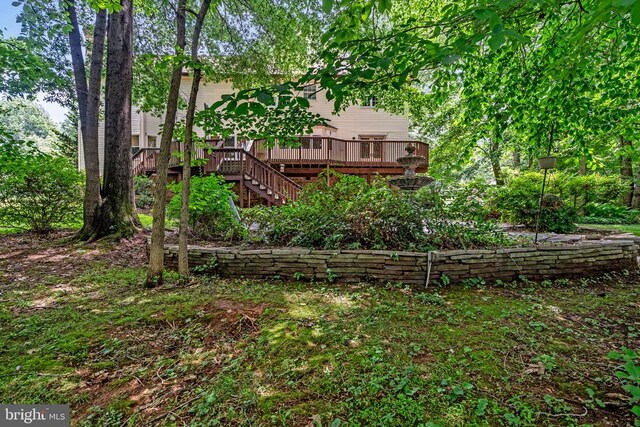  - rear view of property featuring a deck and stairway
