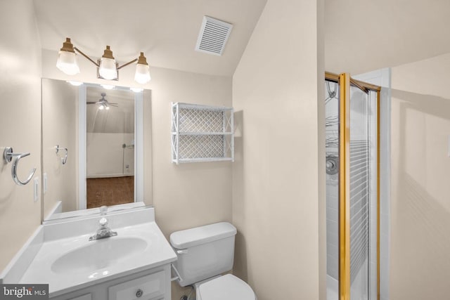  - bathroom with vanity, a shower stall, and a ceiling fan