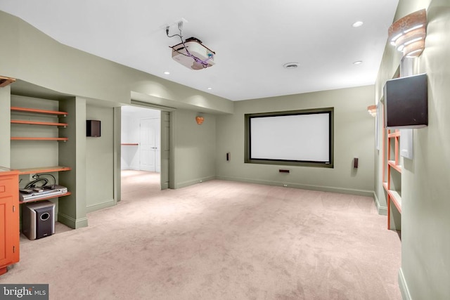  - home theater featuring light carpet and recessed lighting