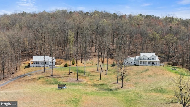  - view from above of property with a heavily wooded area