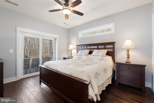  - bedroom featuring access to exterior, dark wood finished floors, and a ceiling fan