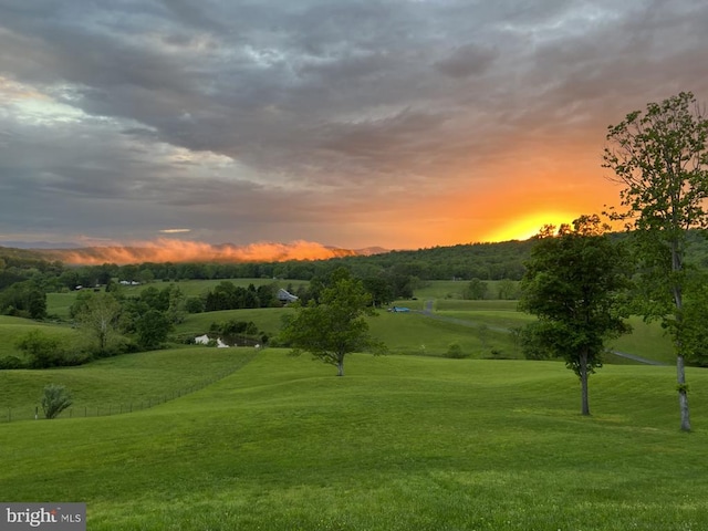  - view of community featuring a yard
