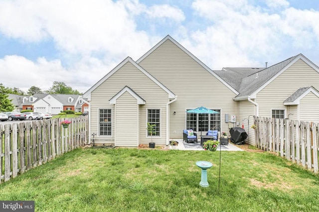 9301 Glascow Dr, Fredericksburg, VA 22408 - back of property featuring outdoor lounge area and a patio