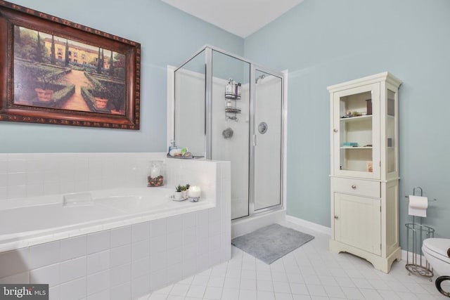 9301 Glascow Dr, Fredericksburg, VA 22408 - bathroom featuring a shower stall, a garden tub, tile patterned flooring, and toilet