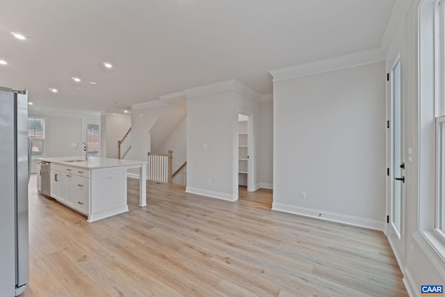 27 Woodburn Rd, Charlottesville, VA 22901 - kitchen with stainless steel appliances, ornamental molding, light wood-type flooring, recessed lighting, and white cabinets
