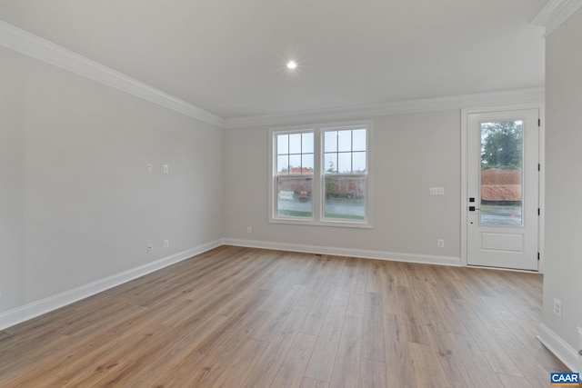 27 Woodburn Rd, Charlottesville, VA 22901 - unfurnished living room with crown molding, plenty of natural light, light wood-type flooring, and recessed lighting
