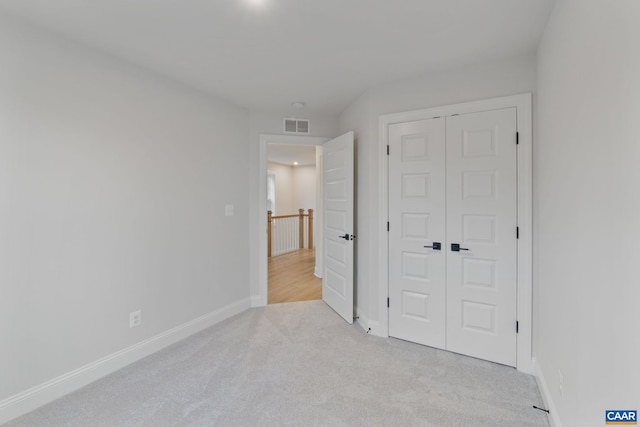 27 Woodburn Rd, Charlottesville, VA 22901 - unfurnished bedroom featuring carpet flooring and a closet