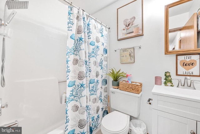 5129 Pecan Dr, Fredericksburg, VA 22407 - bathroom with toilet, vanity, and shower / bath combo with shower curtain