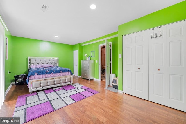 5129 Pecan Dr, Fredericksburg, VA 22407 - bedroom with wood finished floors, baseboards, a closet, and recessed lighting
