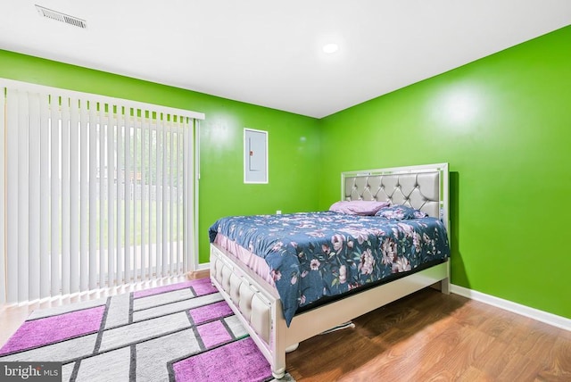 5129 Pecan Dr, Fredericksburg, VA 22407 - bedroom featuring wood finished floors, baseboards, and access to exterior