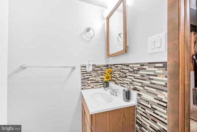 5129 Pecan Dr, Fredericksburg, VA 22407 - bathroom featuring vanity and decorative backsplash