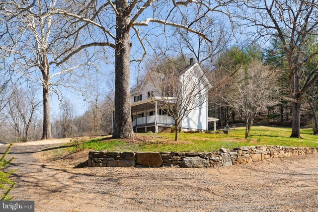 exterior space with a front lawn