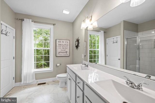 109 Poplar Dr, Louisa, VA 23093 - bathroom with healthy amount of natural light, double vanity, a stall shower, and marble finish flooring