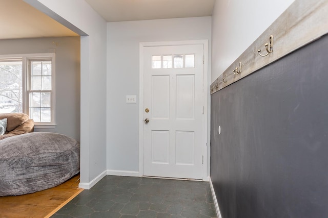 interior space featuring baseboards