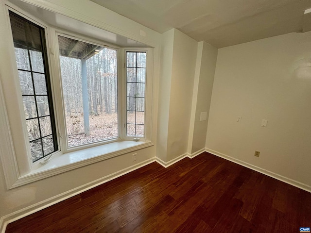 3264 Martin Kings Rd, Charlottesville, VA 22903 - spare room with dark wood-style flooring and baseboards