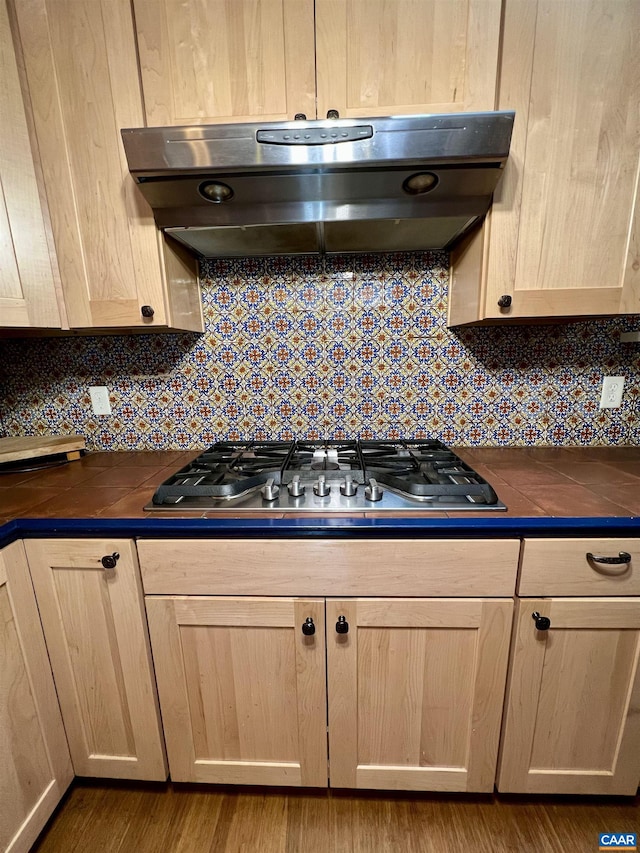 3264 Martin Kings Rd, Charlottesville, VA 22903 - kitchen with wall chimney range hood, light brown cabinets, stainless steel gas cooktop, and tasteful backsplash